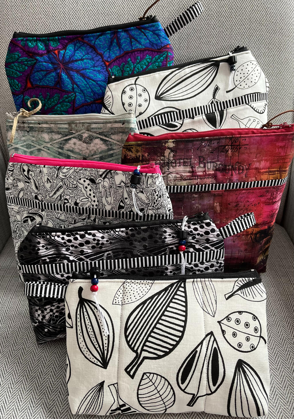 Multi purpose pouches with zippers. Many colours and sizes. Available at Textures Craftworks on Locke St., Hamilton